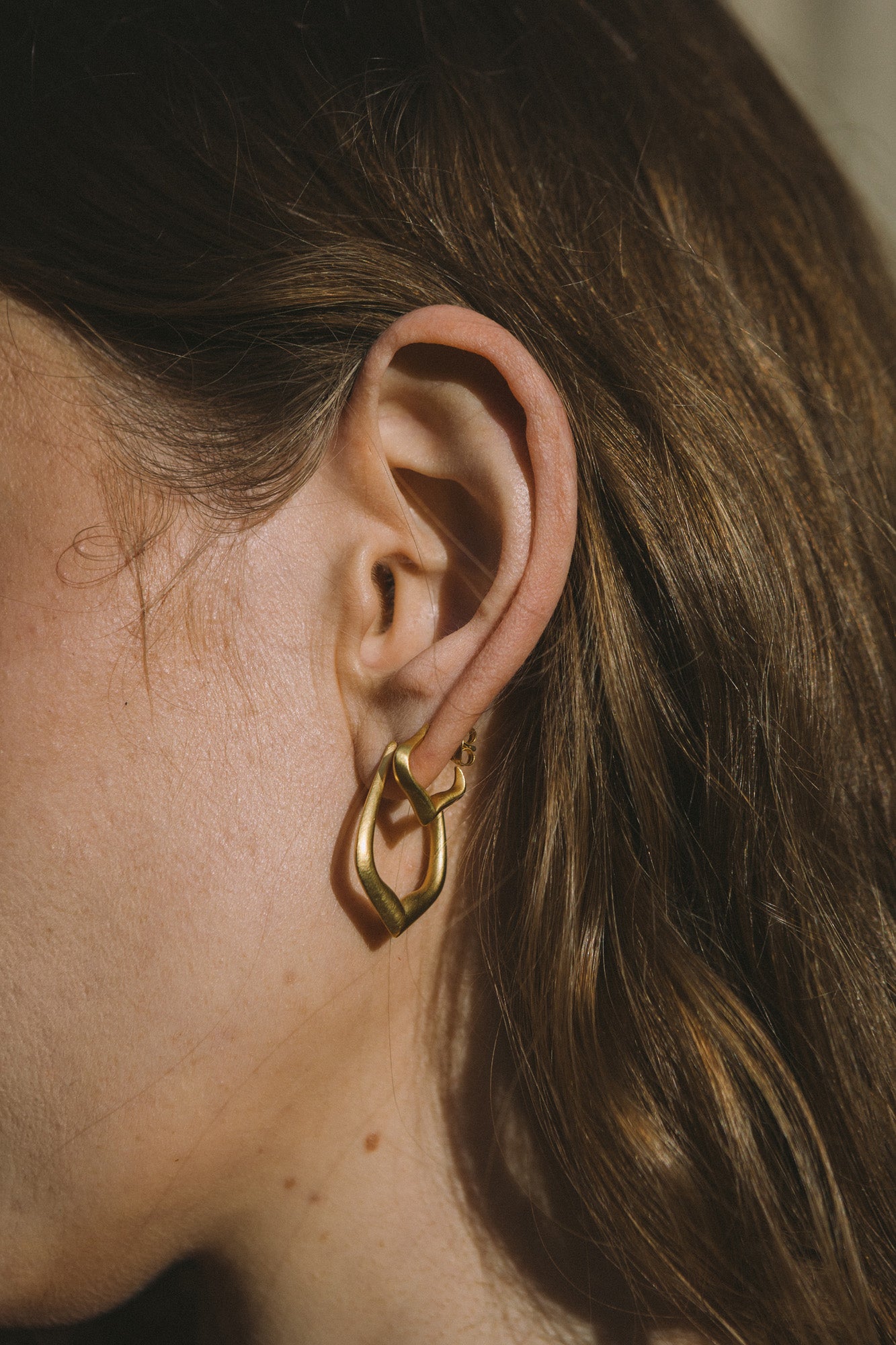 Model in Essence of Persia Gold Vermeil Hoops