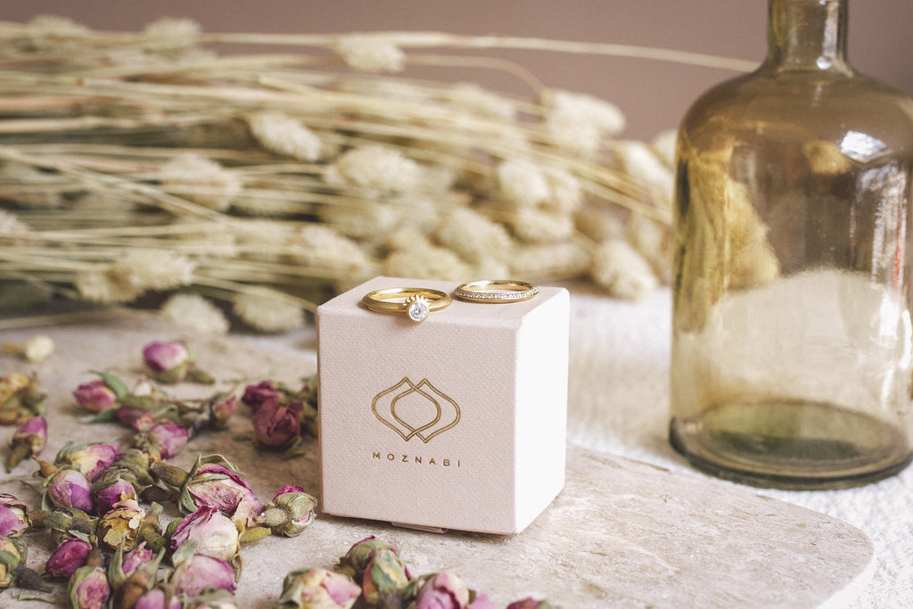 Aroosi Darya Diamond Ring shown with Moznabi ring box