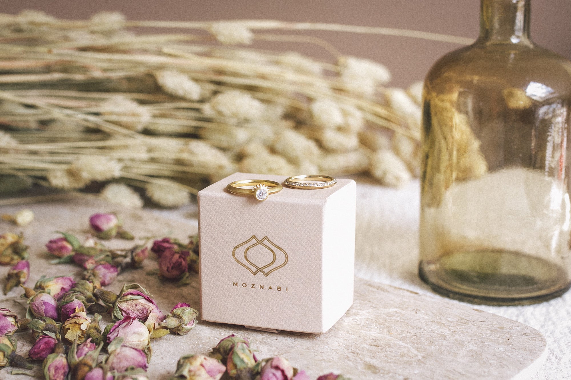 Aroosi Darya Diamond Ring shown with Moznabi ring box