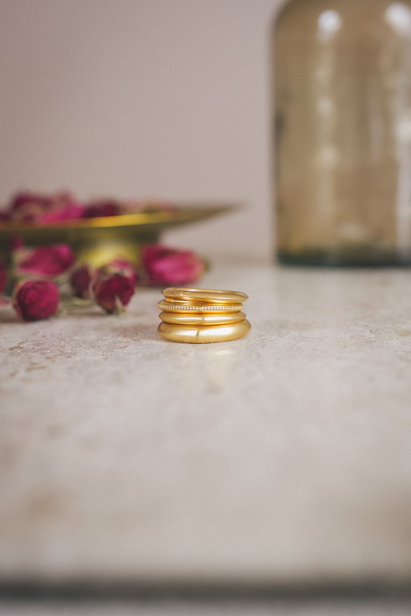 Four handmade gold wedding bands from the Moznabi Jewellery Aroosi Collection