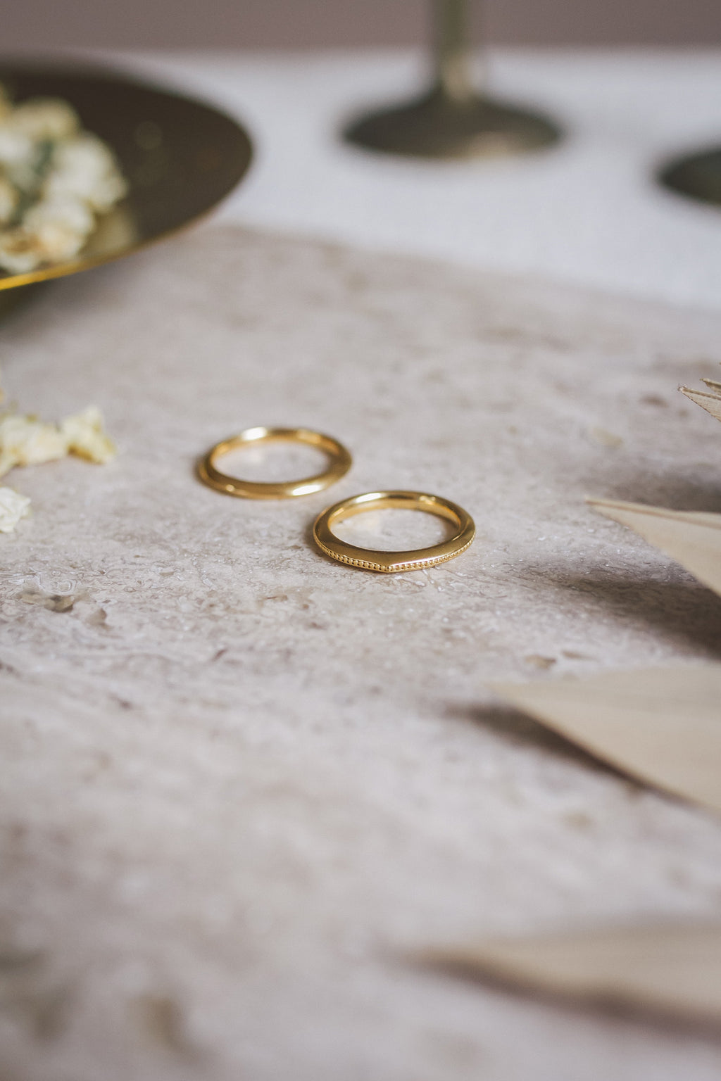 Two Aroosi Classic Knife-Edge & Milgrain Wedding Bands with textured detail