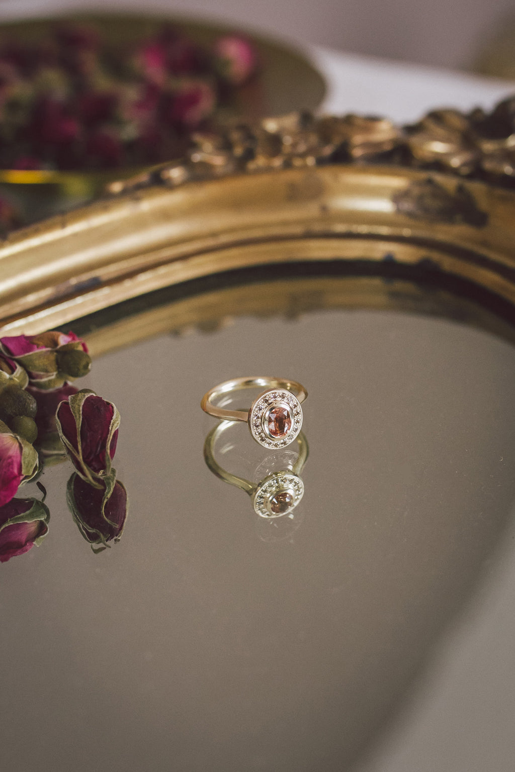 The Aroosi Oval Sapphire Halo Ring is handmade by Roxanna Moznabi