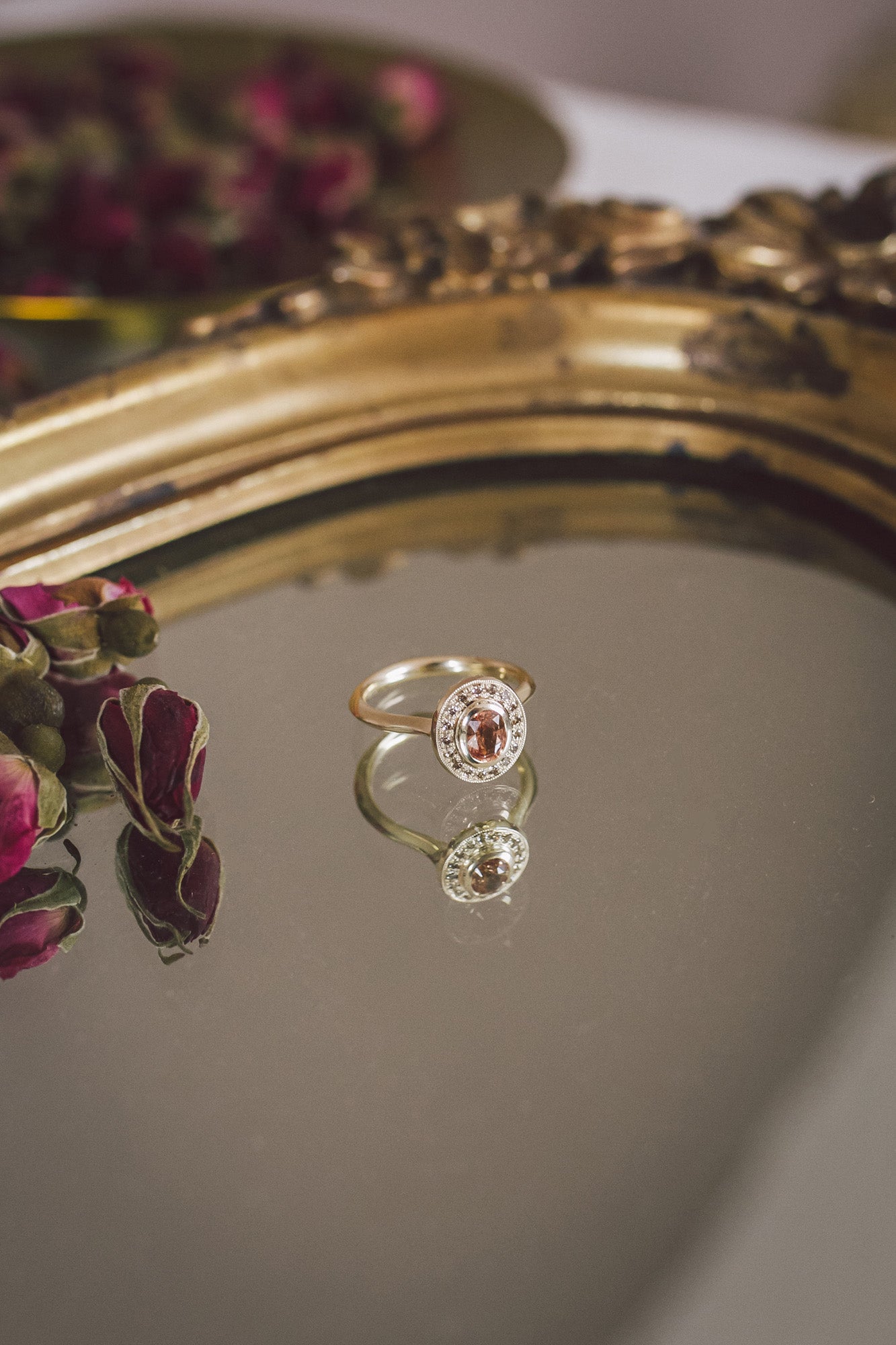 The Aroosi Oval Sapphire Halo Ring is handmade by Roxanna Moznabi