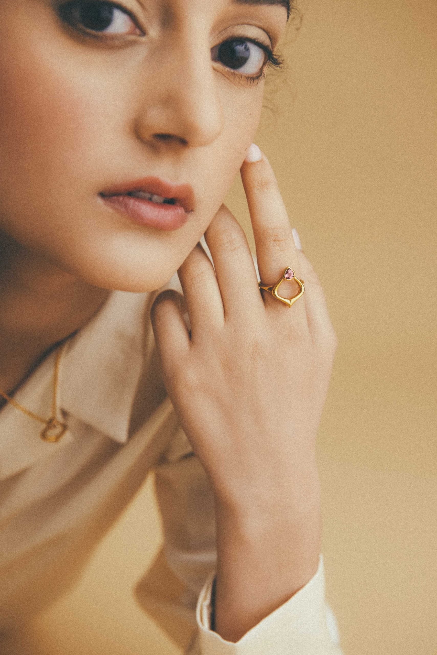Closeup of model wearing the Alborz Ring handmade by Moznabi Jewellery